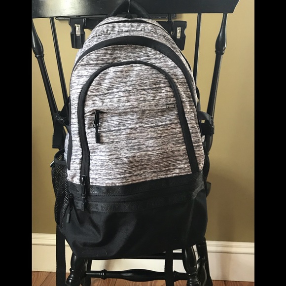 gray and black pink backpack